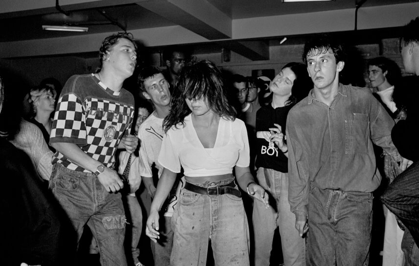 Men and women dancing at a nightclub